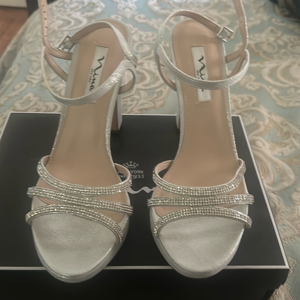 Woman heels. Only worn once for a wedding.